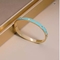 贅沢なブランドは青い愛バックルのブレスレット24kの金のステンレス鋼の腕輪にエナメルを塗った
